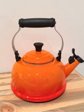 LE CREUSET Orange Flame Enamel Whistling Kettle with Black Handle